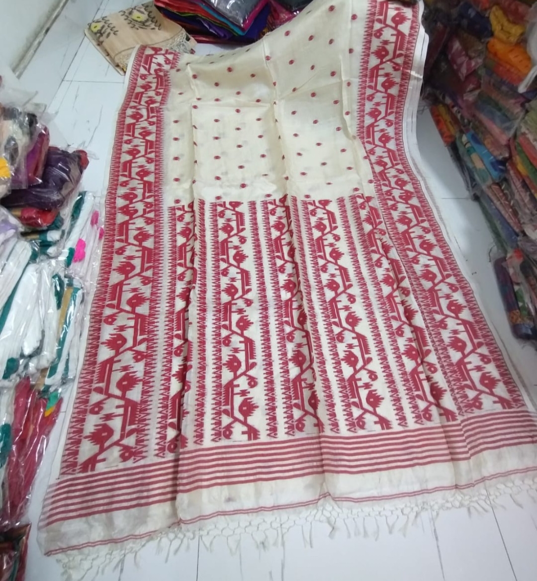 Handloom white pure tussar silk saree with red boarder